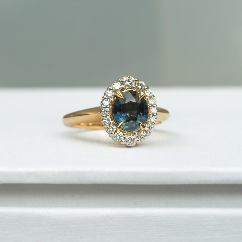 Teal Sapphire Graduated Diamond Halo